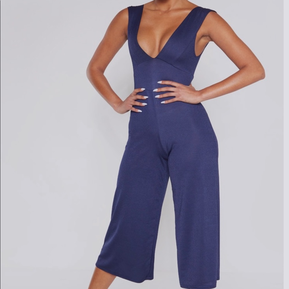 Navy jumpsuit. Never worn.